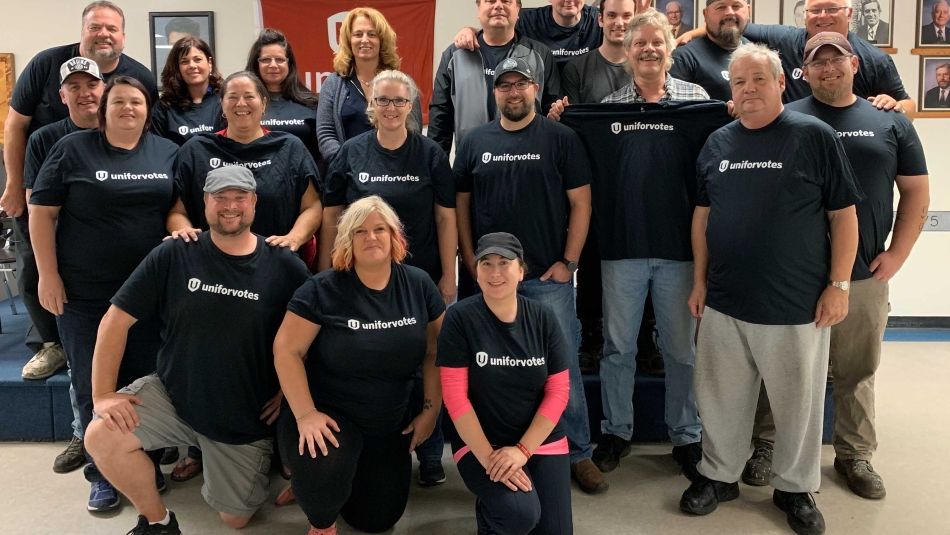 Katha Fortier and a group fo Unifor volunteers wear matching "Unifor Votes" t-shirts.