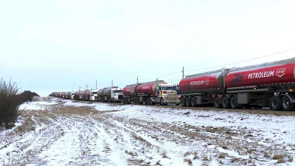 A long line of Co-op tanker trucks.