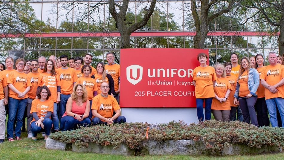 Unifor staff where matching orange shirts in front of the national office in Toronto.
