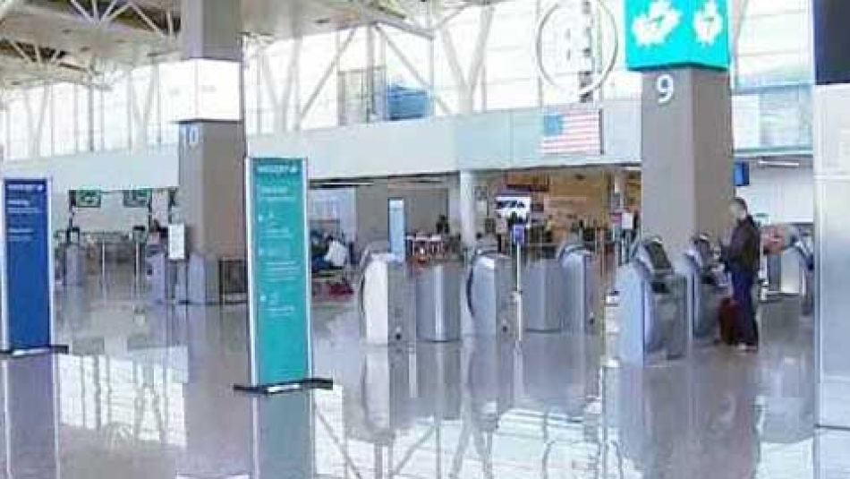 A photo of the interior of an airport terminal.