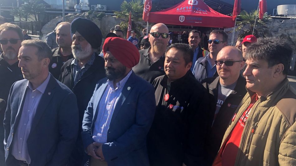 A group of Unifor members, including Western Regional Director Gavin McGarrigle.