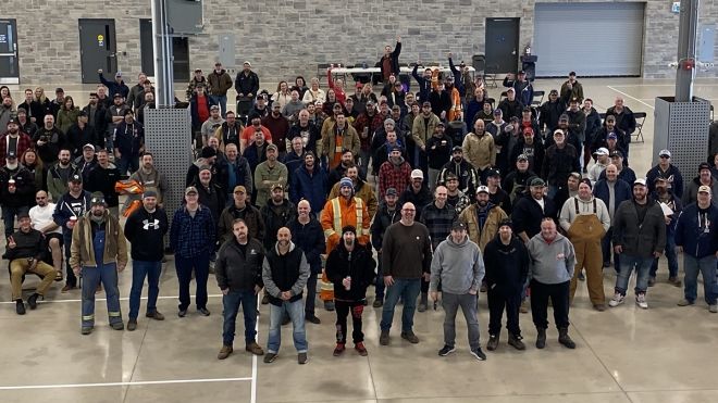 Large group of workers inside taken from above