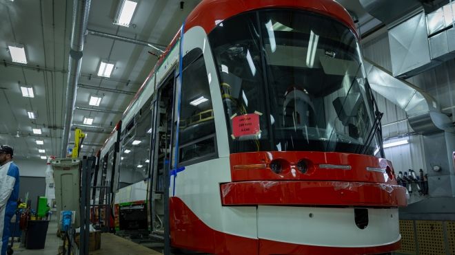 shinny red and white transit car