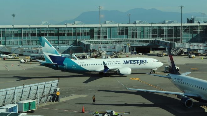 Westjet plane on the tarmac.