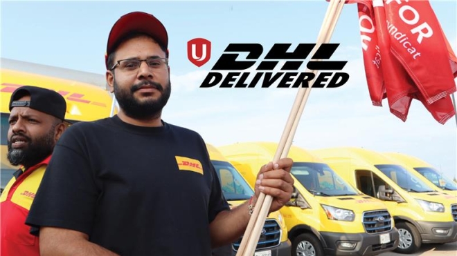 DHL delivered, a man holding a flag in front of DHL trucks