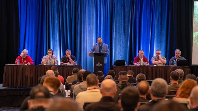 A man speaking at a podium