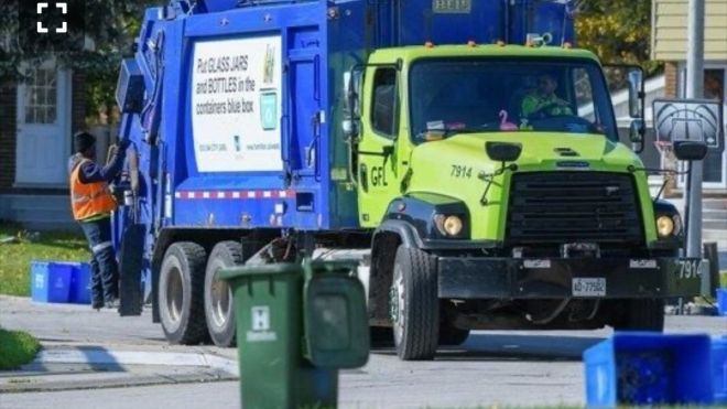 A Green for Life garbage truck