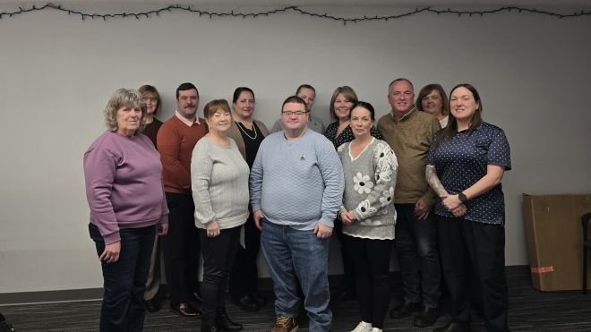 A group pose smiling at the camera