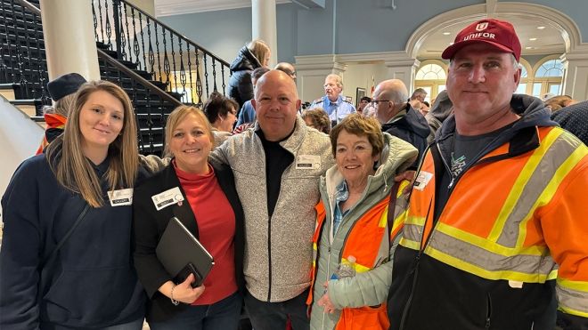 Atlantic Regional Director Jennifer Murray stands with Autoport members inside the Nova Scotia Legislature