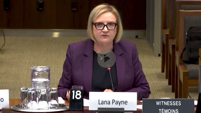 Lana Payne speaking at a hearing 