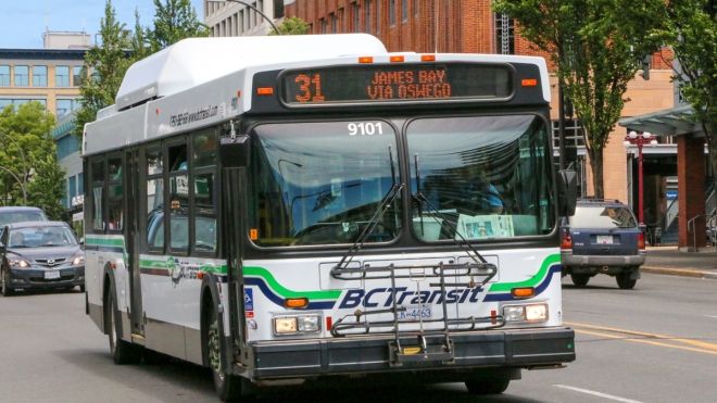 BC Transit bus driving in traffic, with 31 James Bay via Oswego on the display