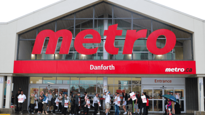 Members holding the line in front of a Metro store