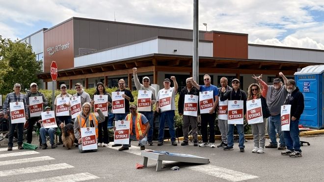 A group of people with strike signs.