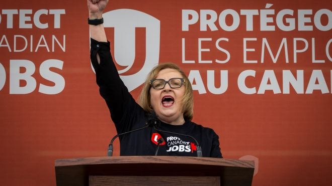 Lana Payne with a fist raised in Windsor, Ontario