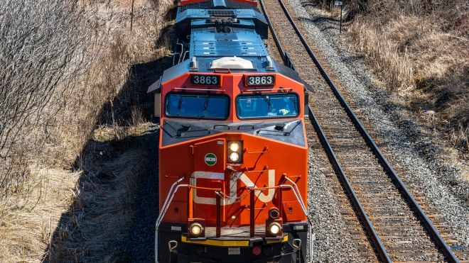 CN train moving down a track