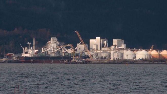 Distant view of Rio Tinto industrial facility in Kitimat from the water.