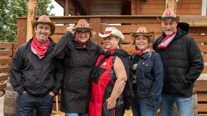 five people in cowboy hats