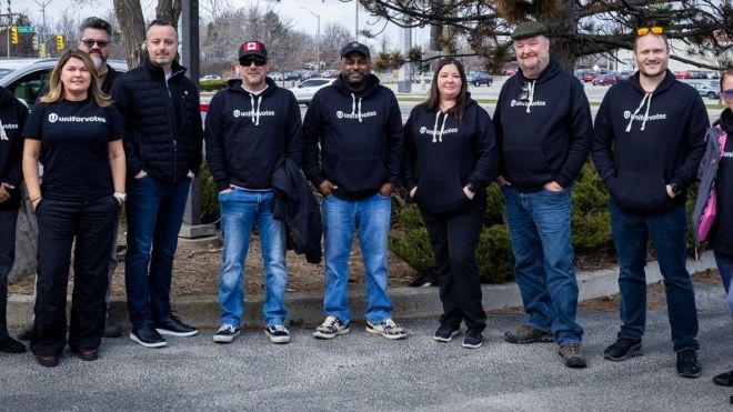 Ten people wearing Unifor Votes shirts