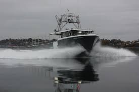 A boat speeds through the water.