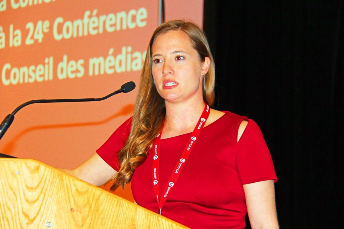 Heather Gillis of Local 915M addresses Media Council from the podium.