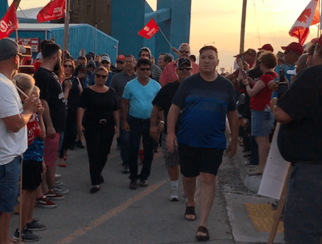 Jerry Dias leads scabs out of the Compass Minerals Salt Mine in July 2018.