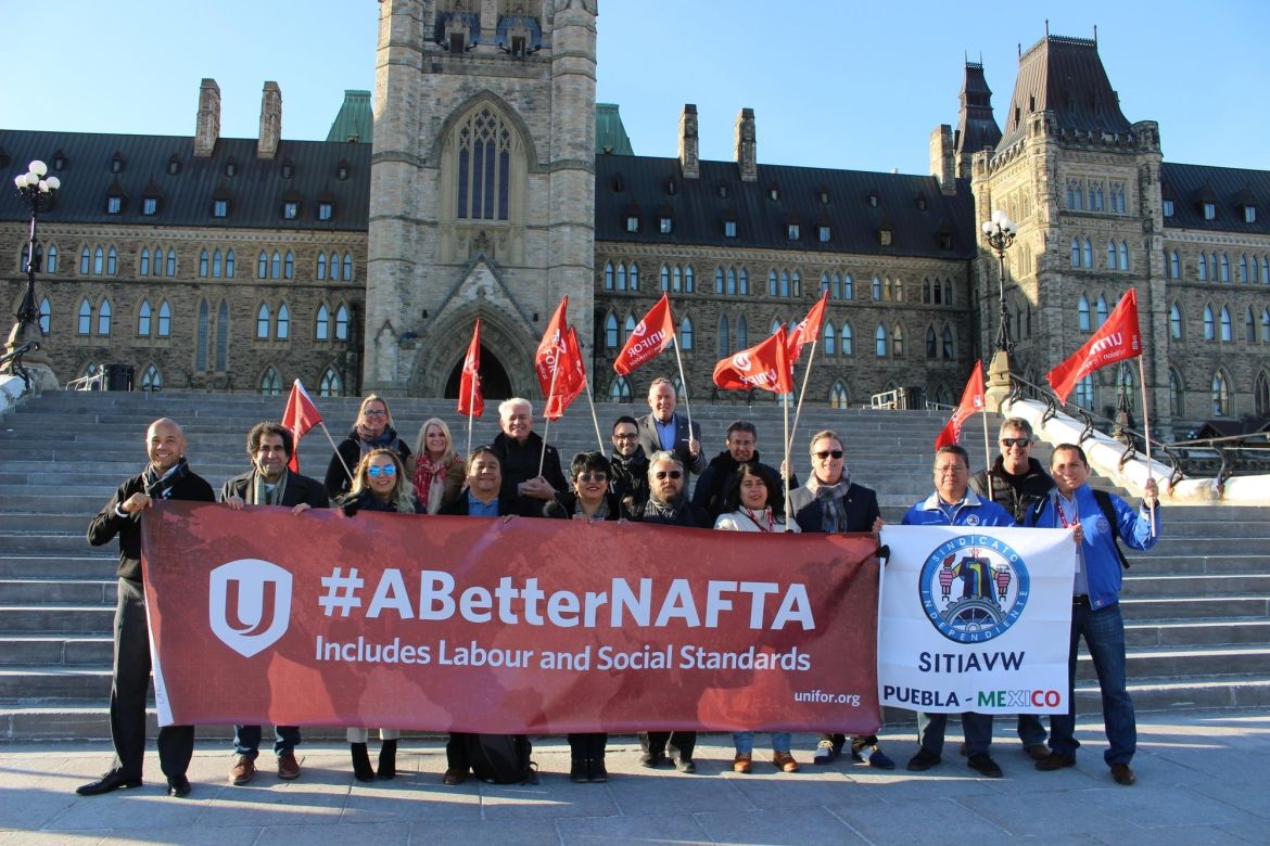Unifor members along with Mexican labour activists on Parliment Hill in Ottawa.