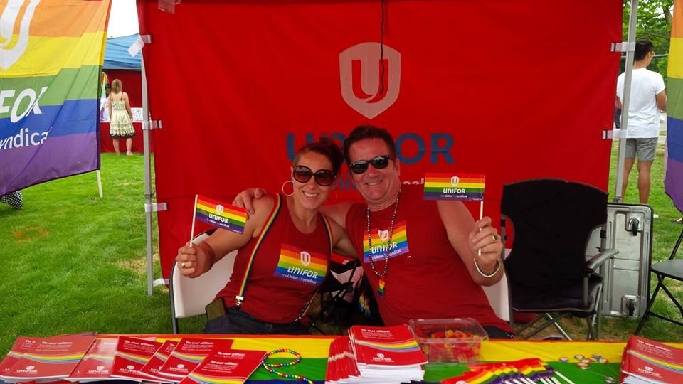 Members at pride booth in BC