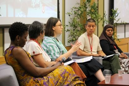 a pannel of five people taking