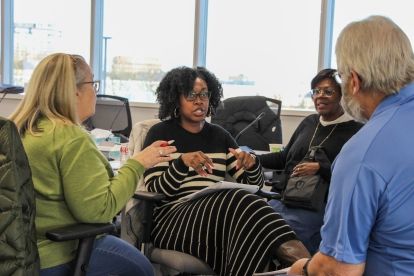 women sitting talking