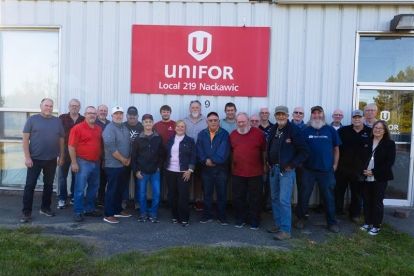 group of people standing outside union hall