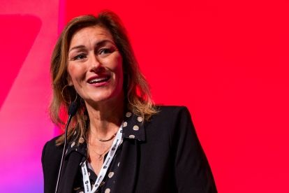 a women speaking at a podium