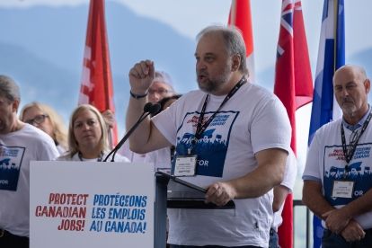 A man speaking at a podium