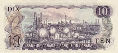 The back of a $10 Canadian bill showing an illustrated chemical facility with several spherical storage tanks.