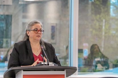 A women at a podium