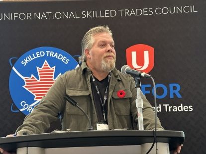 A man speaking into a mic