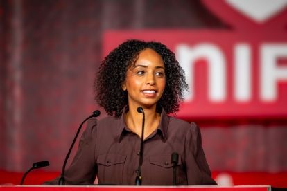 A women speaking at a podium