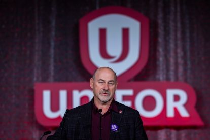 A man speaking at a podium