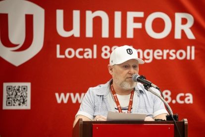 A man speaking at a podium