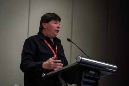 A man speaking at a podium