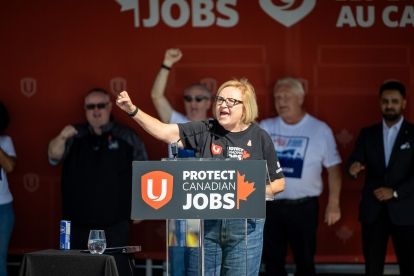 Lana Payne speaking at a mic