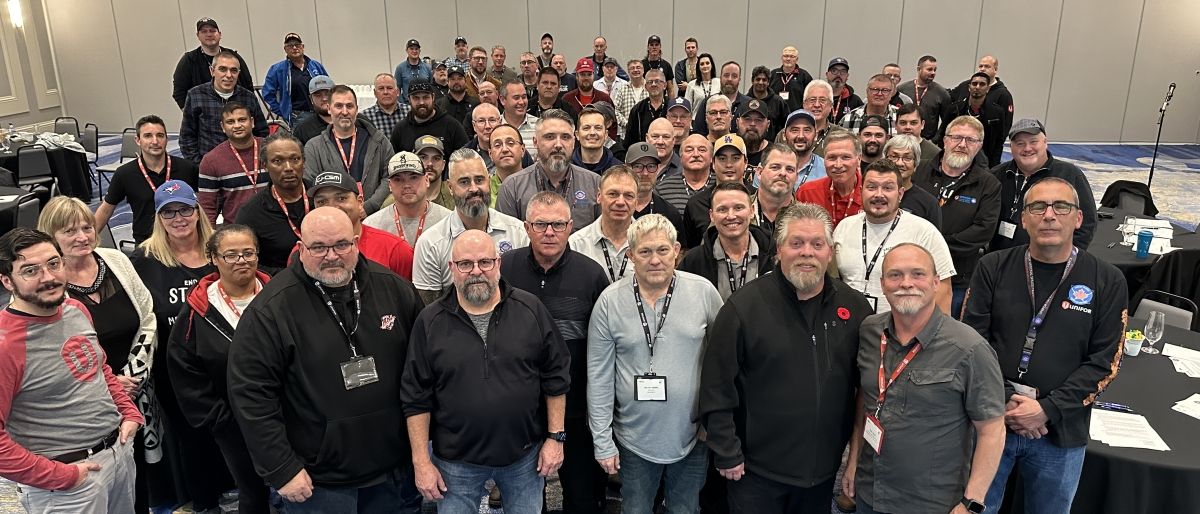 A large group of people gathered for a group photo