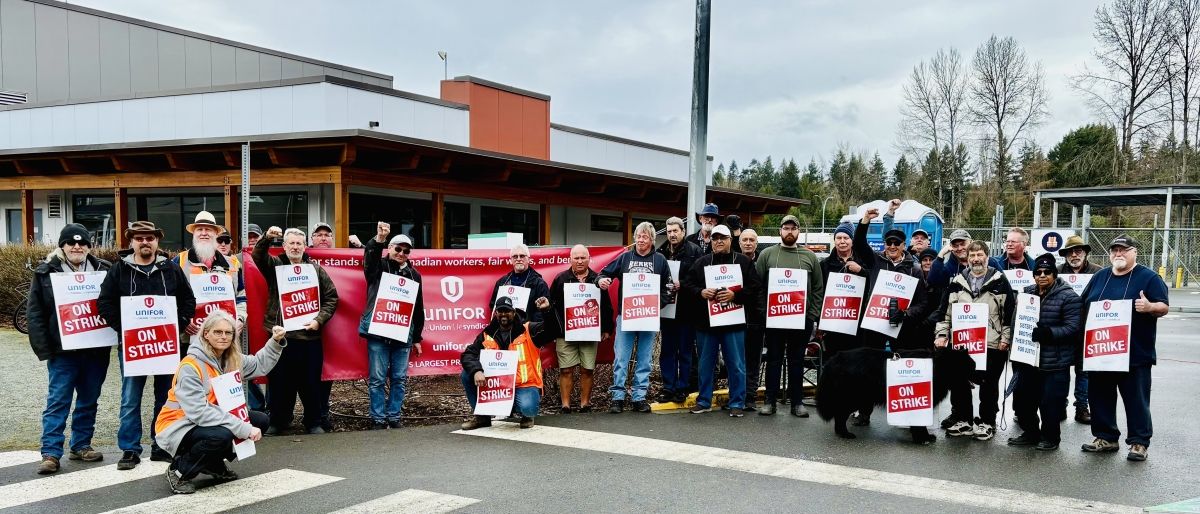 A group of people with strike signs.