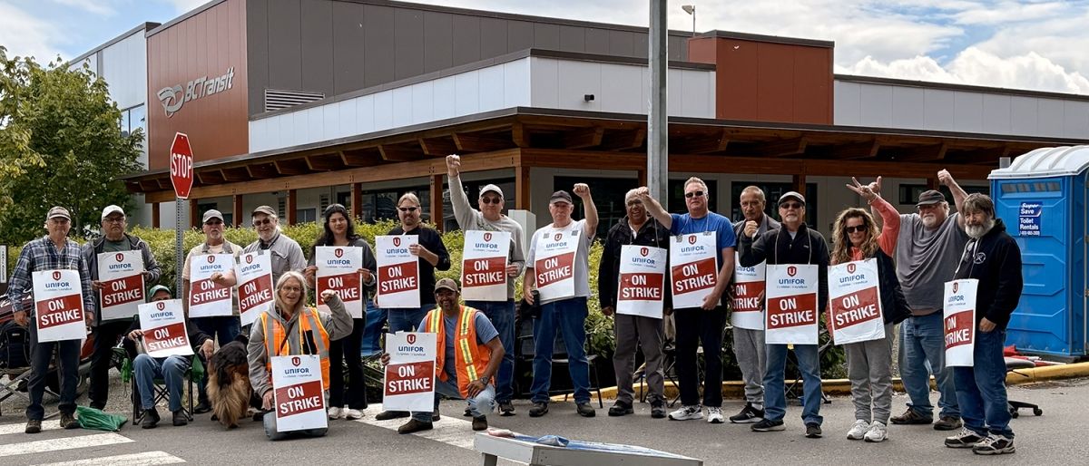 A group of people with strike signs.
