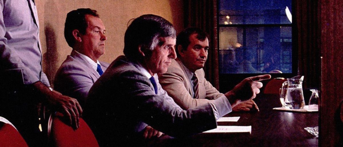 Men sitting at a bargaining table