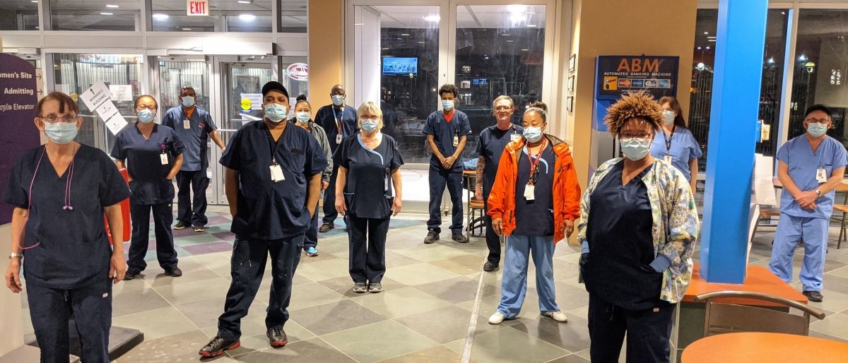 Frontline health care workers in PPE.